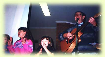 Graham & kids with guitar